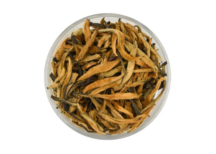 Long golden curls of early spring buds in this Yunnan Golden Buds loose tea from AVANTCHA platinum collection.